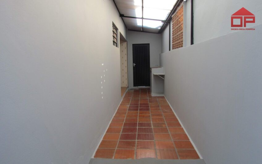 Casa com edícula