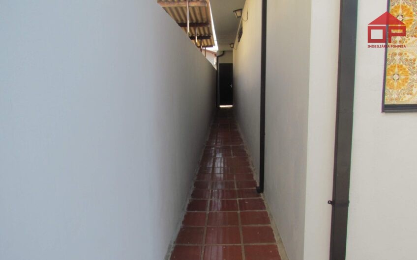 Casa com edícula