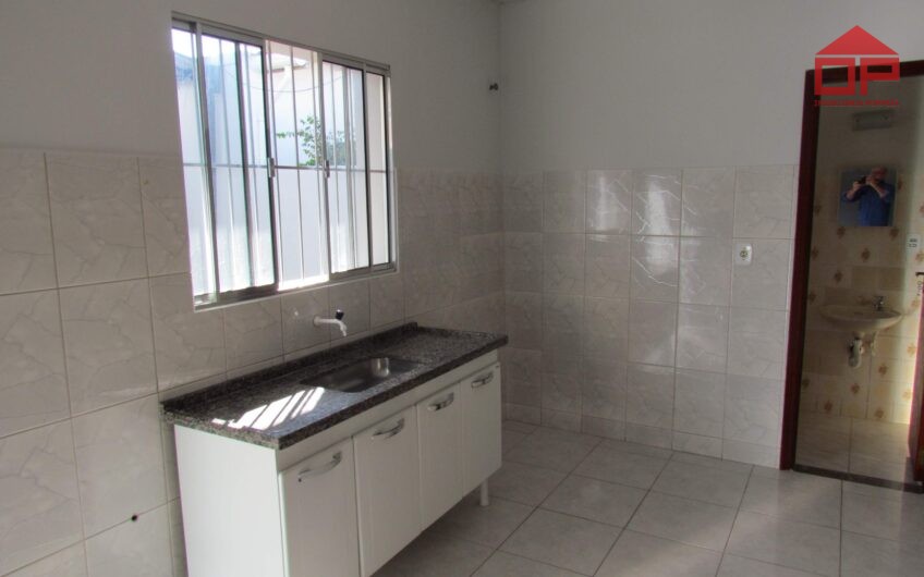 Casa com edícula