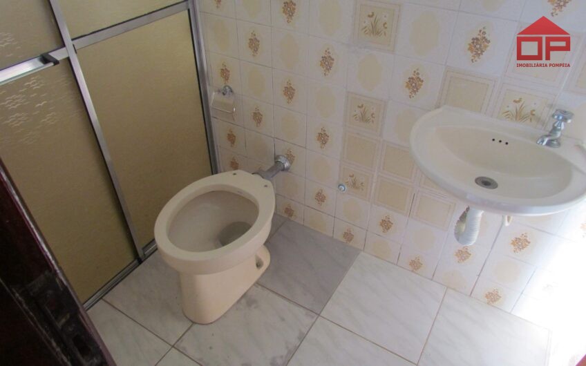 Casa com edícula